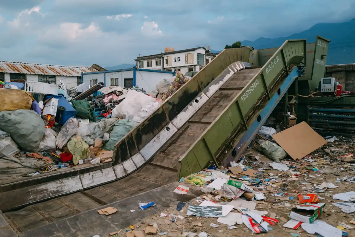 A conveyor and debris in a recycling site.